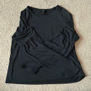 Dressy long sleeve with ruffled loose sleeve at forearm